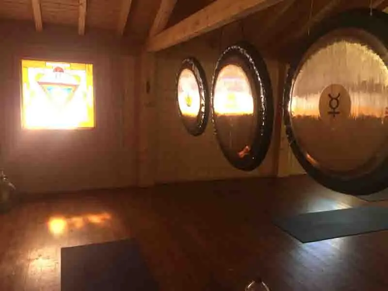 Yoga Holiday February 2027 This is a view of the gongs in the practice space on our Yoga Holiday February in 2027